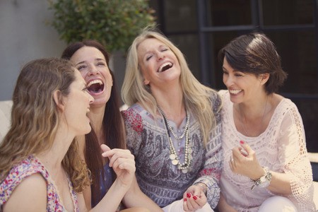 Happy female friends enjoying their friendship relationships.